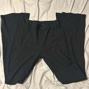 Black flared leggings.